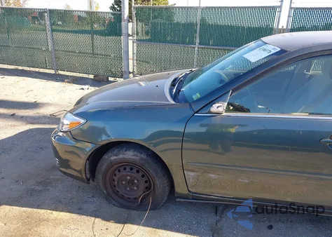 2004 Toyota Camry Le z USA, uszkodzony, nr VIN 4T1BE32K04U332508